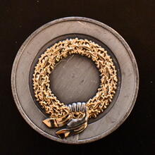 Back of the basic Swedish Armed Forces Coin